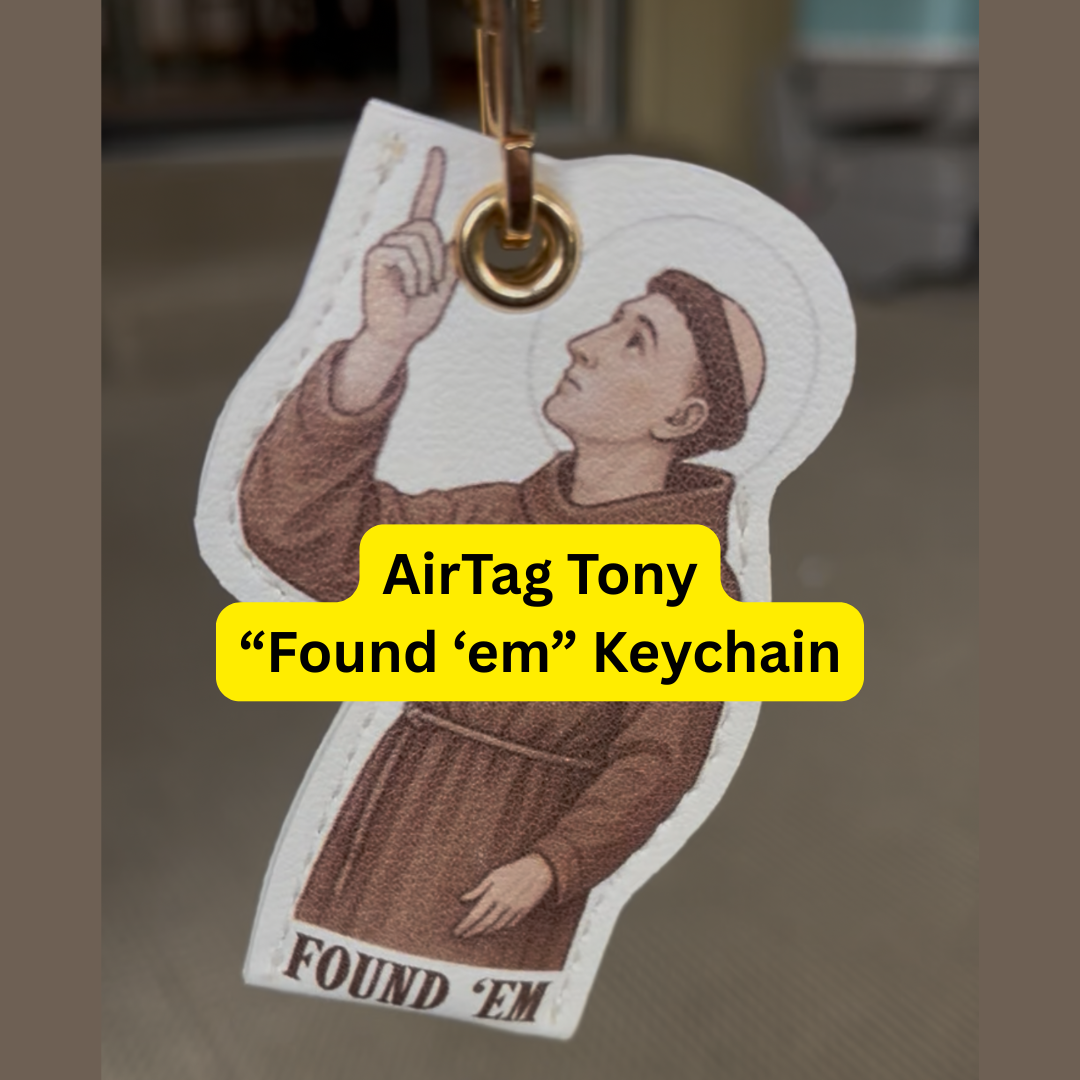 A saint anthony key chain that is able to hold an apple air tag in it.