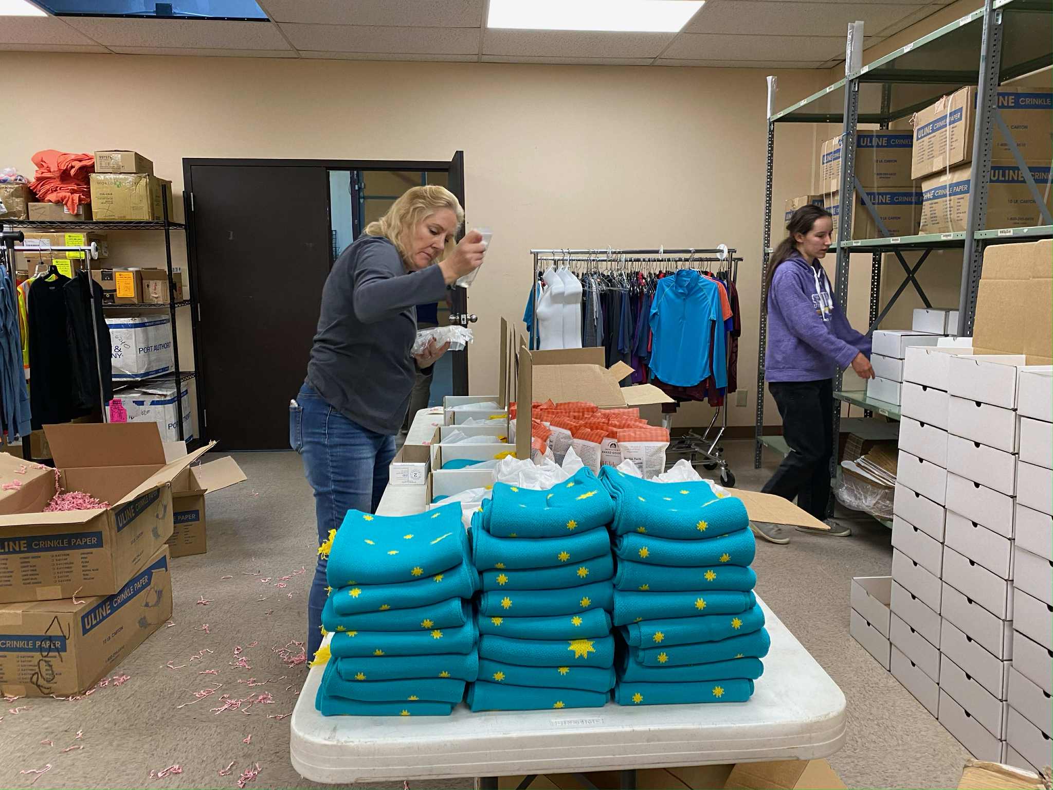 The Little Catholic Box team making and packaging products