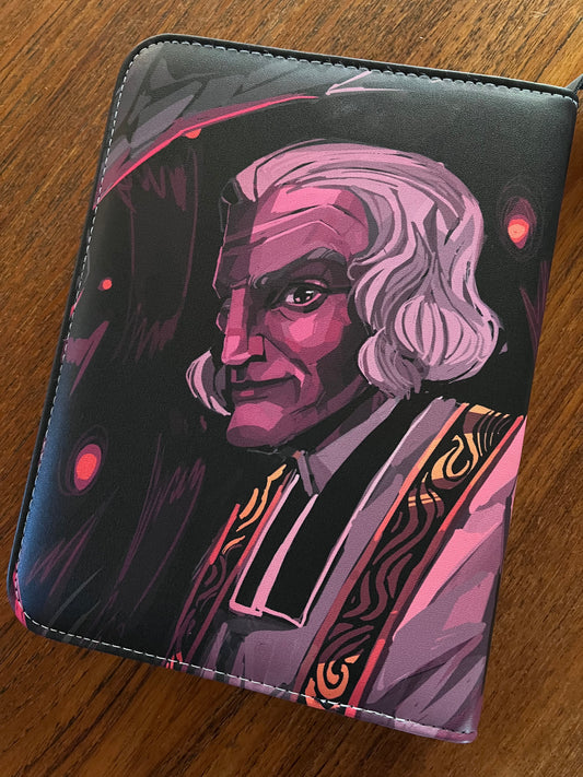 St. John Vianney card binder back